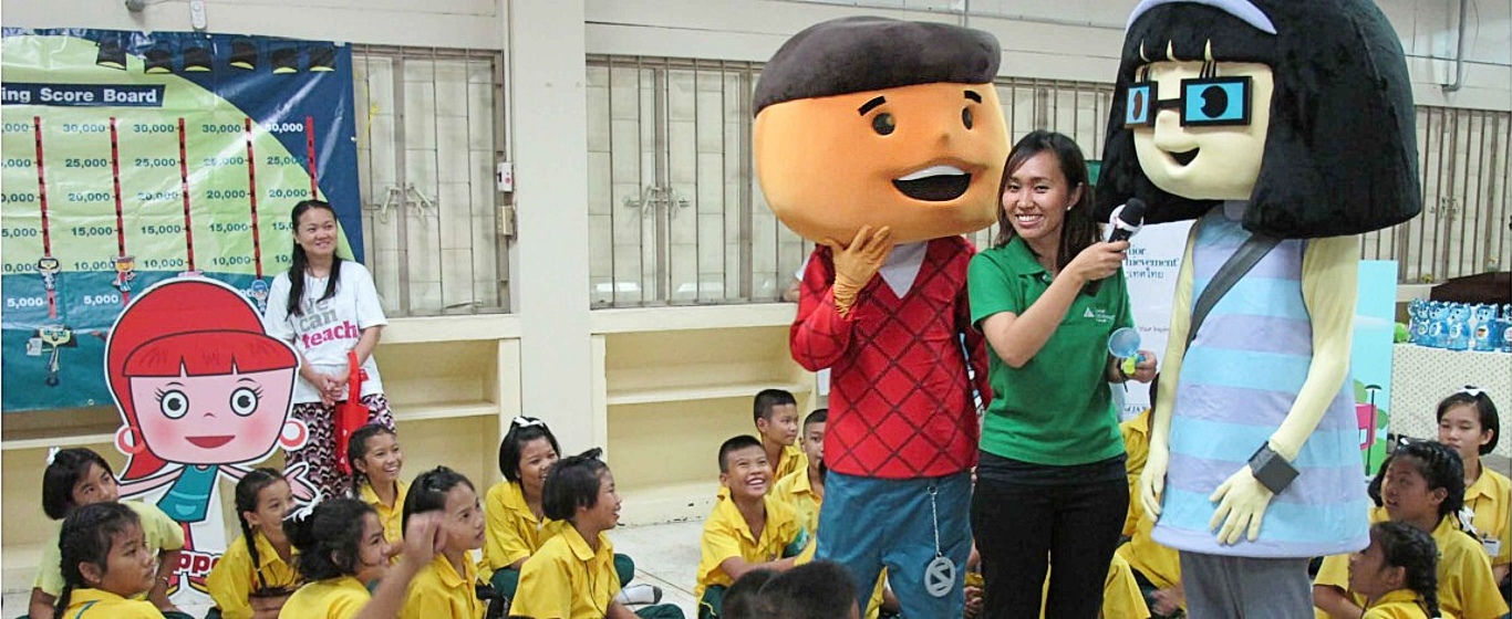 An event host interviewing a mascot