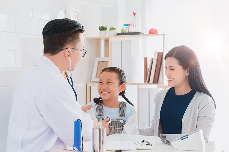 Doctor health check mother and daughter