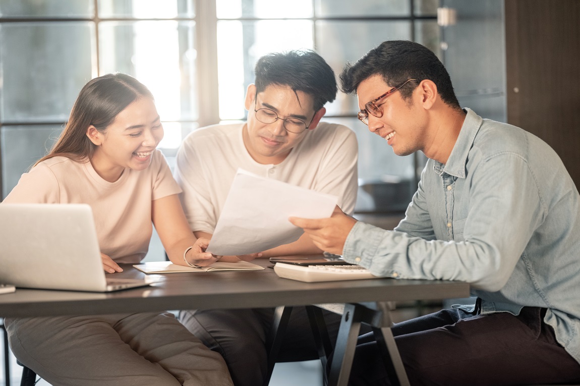 Three people having a discussion
