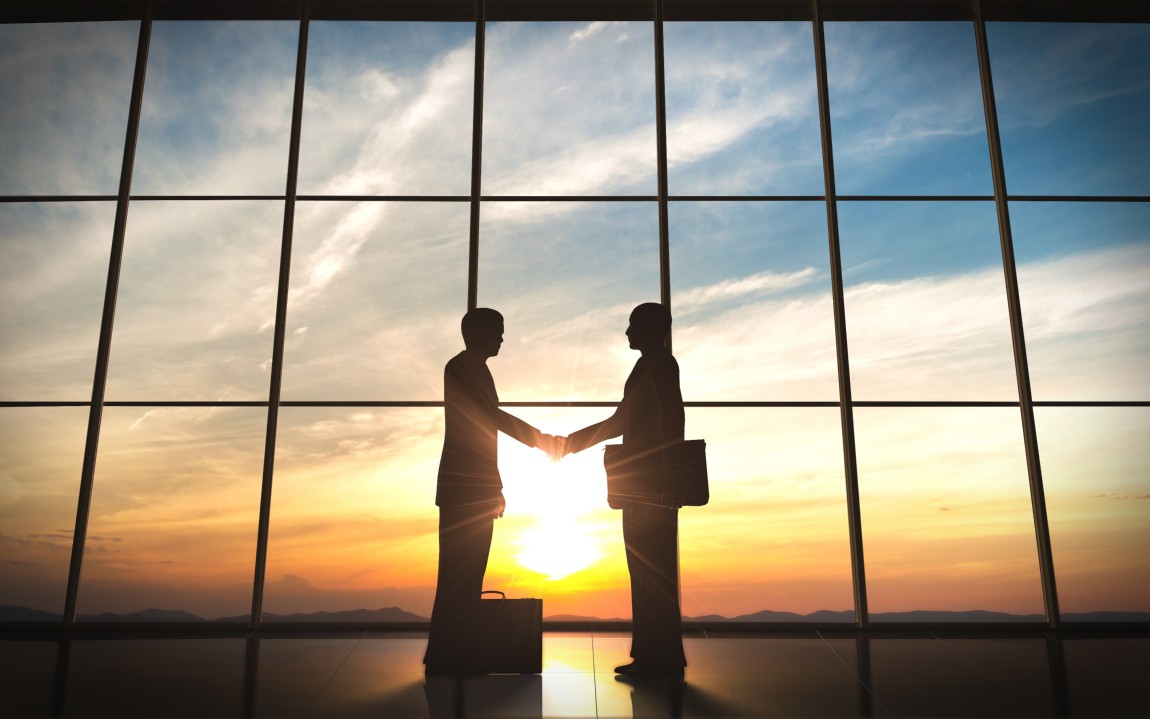 two-business-men-shaking-hands